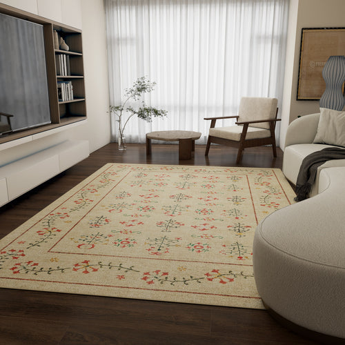 Load image 1 in gallery view. A modern living room with dark wood floors, the Garden Cream - Washable Rug - JRN1026, a white sofa, an armchair, round wooden tables, built-in shelves, a TV, a potted plant, and sheer curtains over large windows.