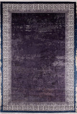 The Geometric and Chic - Washable Rug - JR1273 features a purple rectangular design with a dark center, light gray Greek key border, and slightly worn blue-beige accents—perfect for high-traffic areas. Custom sizes available.