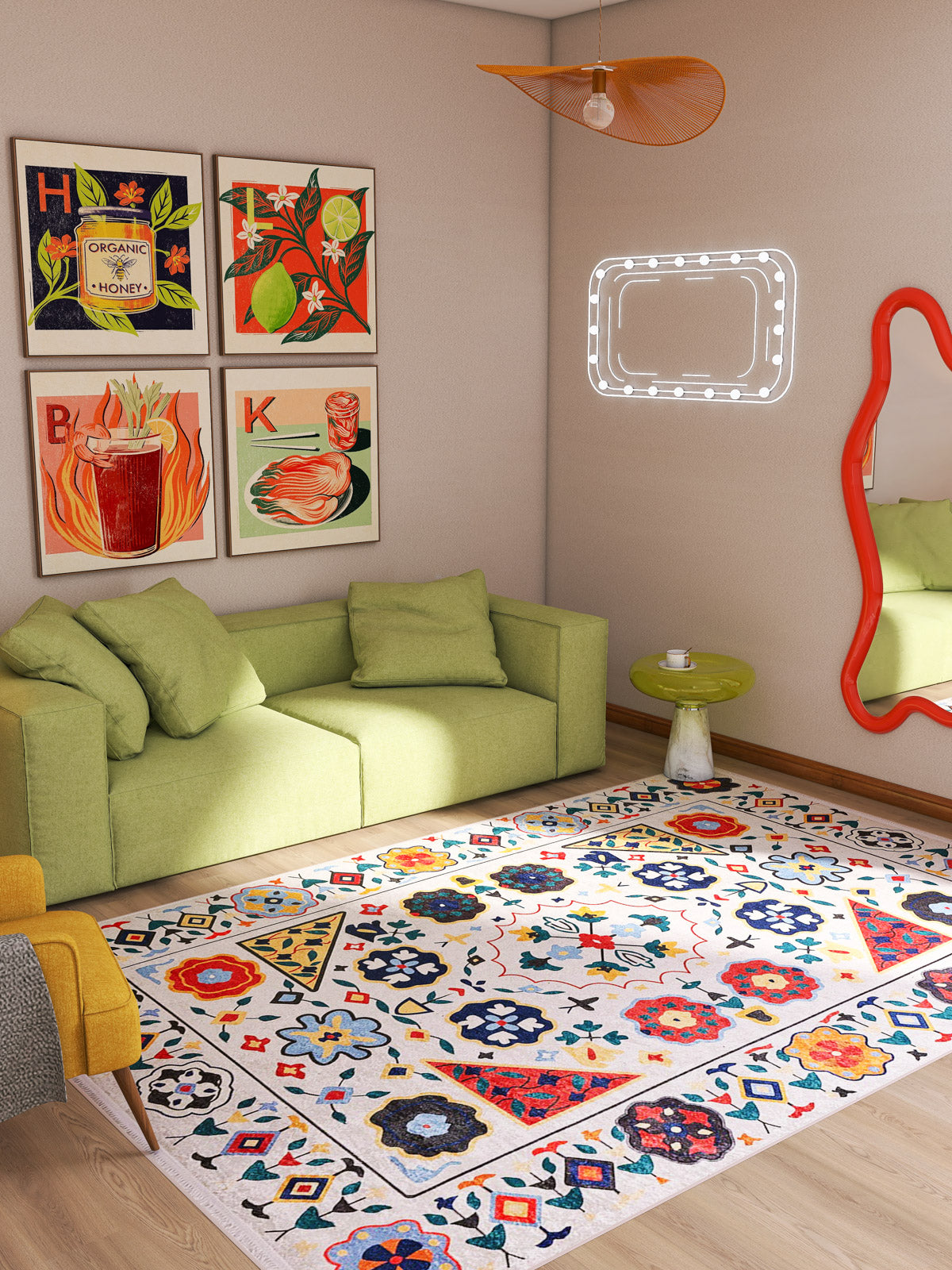 A bright living room features a green sofa, framed artwork, and the Global Gathering - Washable Rug - JR608 (Custom Size). A wavy red mirror and decorative light bring playful style to this cozy, modern space—ideal for high-traffic areas.