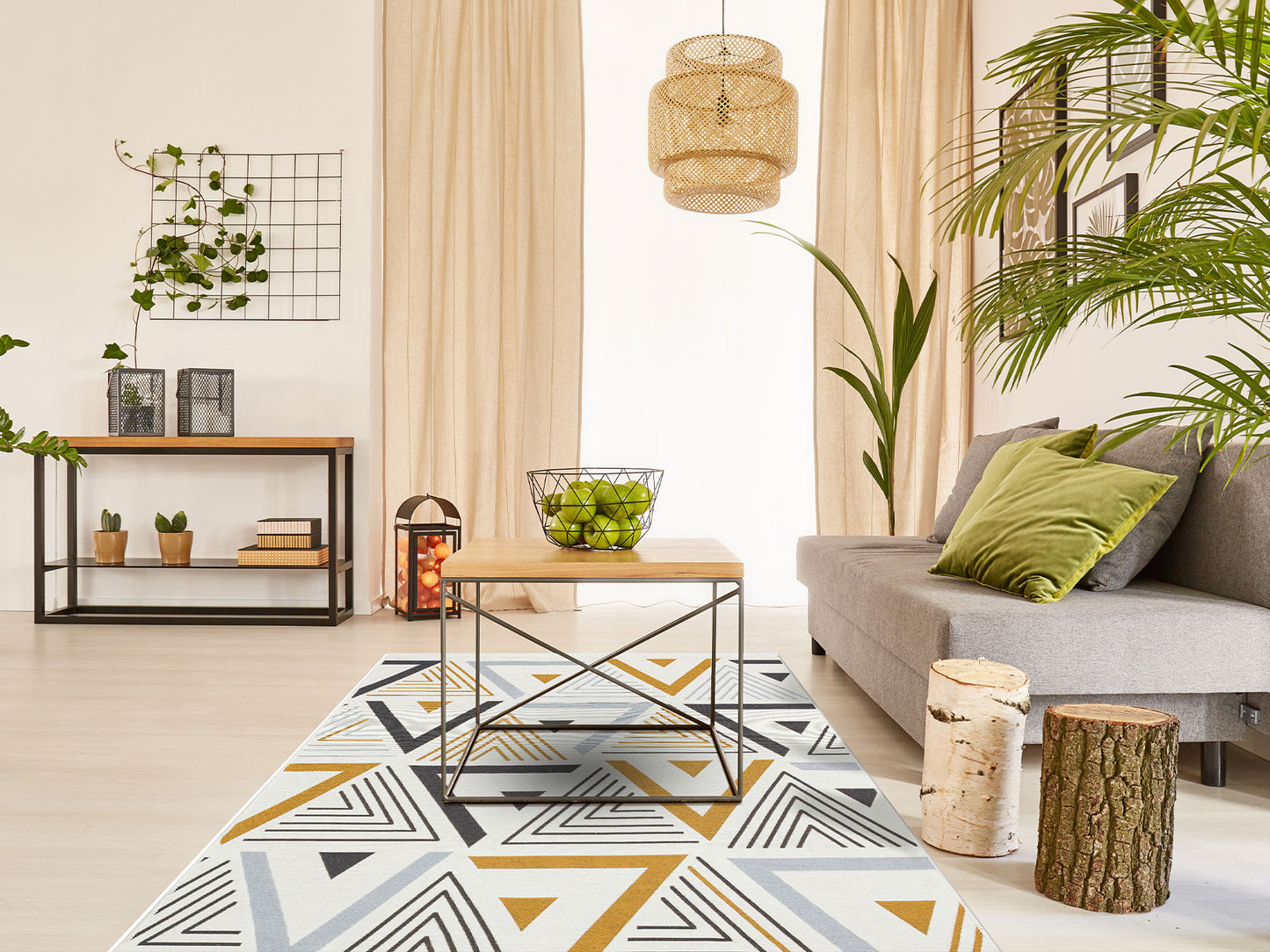 A modern living room features a gray sofa, green cushions, a wooden coffee table, and the Golden Fog - Washable Double-Sided Kilims - AR18. Indoor plants and beige curtains complete the space with natural wood and metal accents for warmth.