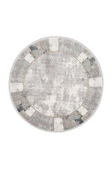 The GridWave Silver Premium Rug - M426A is a round, machine-made rug featuring a distressed gray and beige textured pattern with a modern, vintage-inspired border—ideal for minimalist spaces.