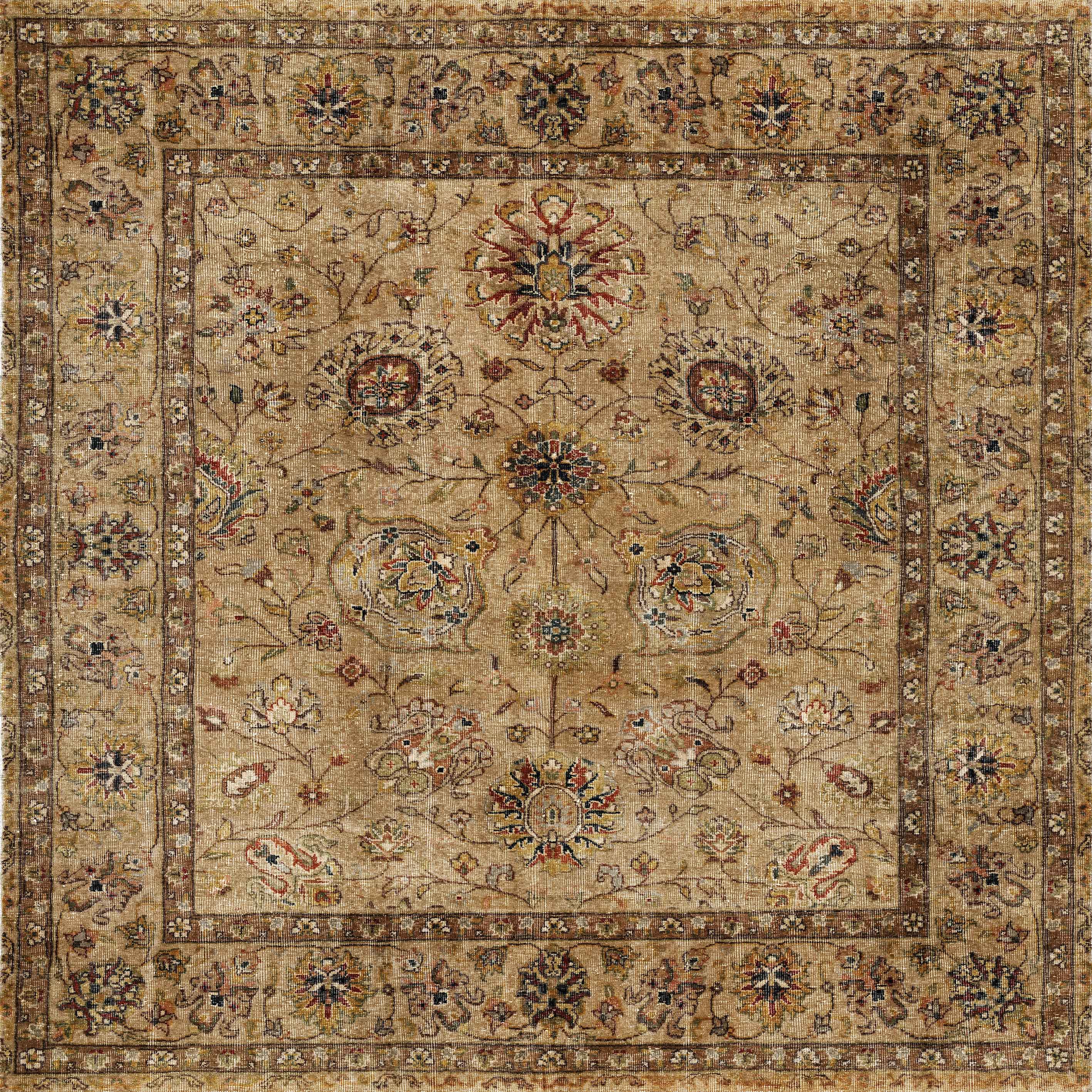 The Heritage Threads - Washable Rug - JRN1007 features an ornate rectangular design with intricate floral and vine patterns in brown, beige, red, blue, and green—ideal for adding a traditional touch to any space.