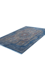 The Hidden Treasures Turkish Rug - Azure - 2223B is a large, rectangular machine-made rug featuring an intricate traditional pattern in blue, brown, and beige, shown on a white background.