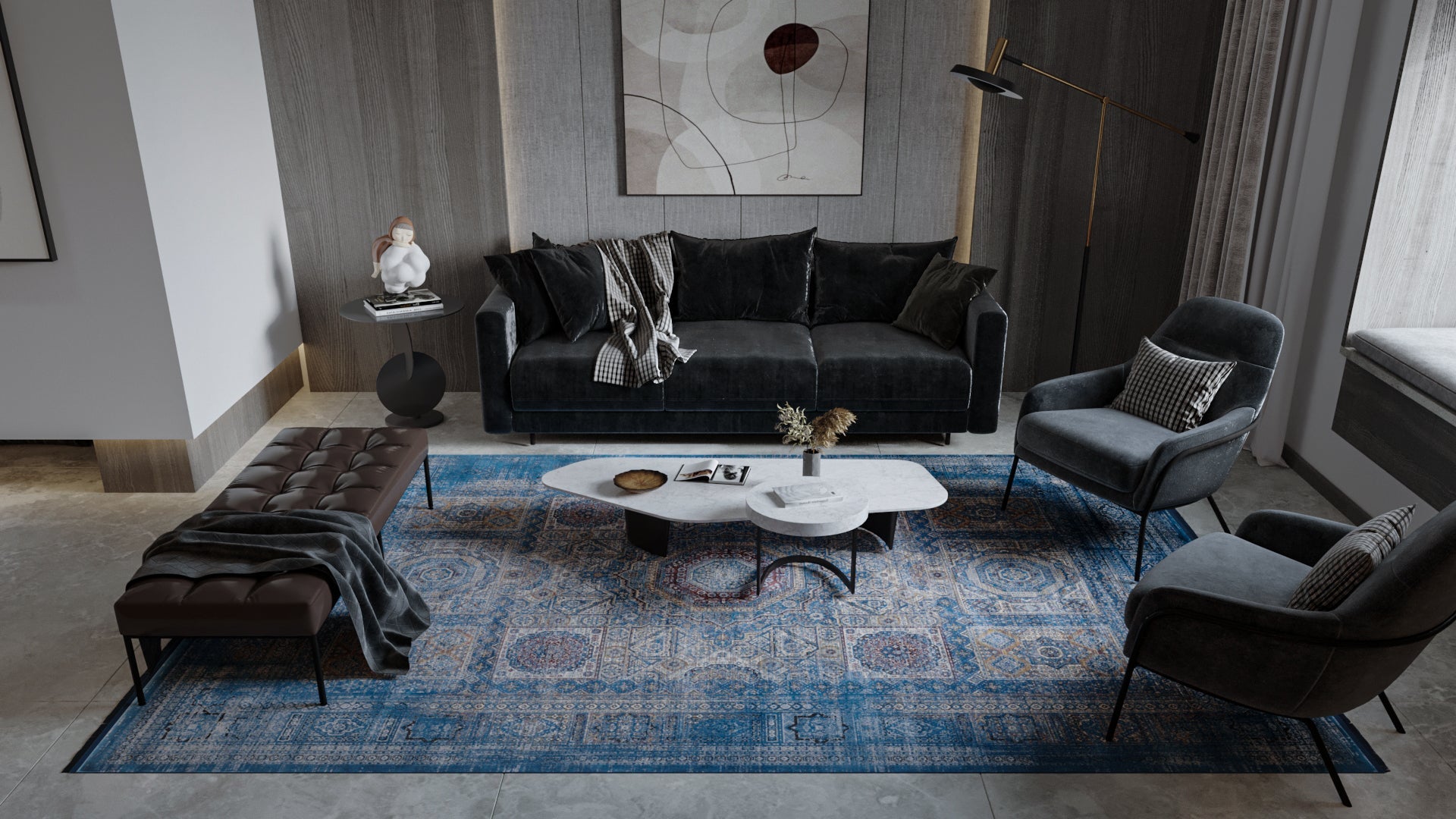 A modern living room features a dark sofa, armchair, bench, and the Hidden Treasures Turkish Rug - Azure - 2223B. A marble coffee table, abstract wall art, floor lamp, and decorative objects complete the cozy, stylish space.