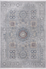 The Hidden Treasures Turkish Rug - Smoky - 2223C features a rectangular shape with intricate geometric and floral patterns in muted blue, gray, and beige tones, centered by a medallion and framed with a decorative border.