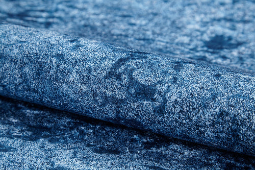 Load image 1 in gallery view. A close-up view of the Ivory Whisper - Washable Rug - JR1628 (Custom Size) shows its mottled, velvety blue pattern—perfect for high-traffic areas and easy to maintain.
