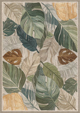 The Amazon Veil - Washable Rug - JRS010 features a dense, textured design of overlapping green, yellow, brown, and beige tropical leaves—combining style and durability for high-traffic areas.