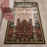 The Blossom Path - Washable Rug - JRS021, featuring intricate torii gates and floral patterns, lies beside a gray sofa with a pink blanket. Its design adds charm to contemporary spaces with light wood floors.