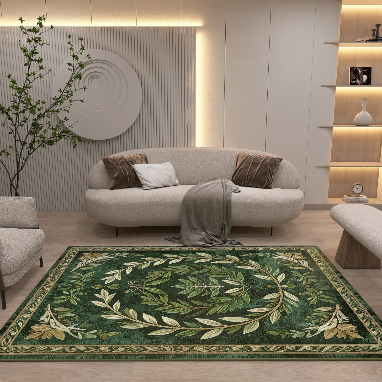 A modern living room with a light sofa, cushions, and a gray throw, featuring the Laurel Crown - Washable Rug - JRS024 with a geometric pattern, minimalist wall art, shelves with vases, and a potted plant—ideal for stylish spaces.