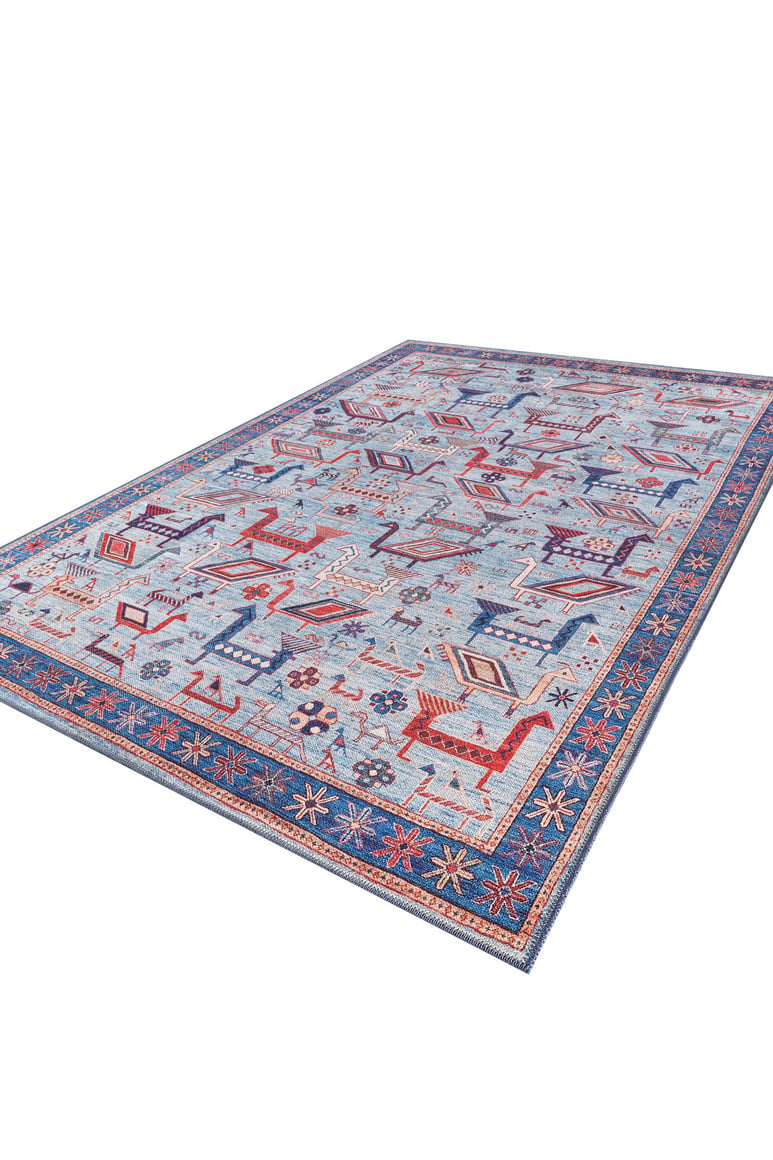 The Birdwatcher's Dream Blue Washable Rug - LCC3020 features a rectangular light blue base with vibrant geometric and animal patterns in red, orange, and blue, bordered by a dark blue floral edge. Ideal for high-traffic spaces, it adds playful style to any room.