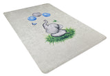 The Joyful Elephant - Machine-Washable Rug JRC026 (Custom Size) is a rectangular, light-colored, allergy-friendly rug showing a playful gray elephant on green grass reaching its trunk toward blue bubbles and a butterfly.