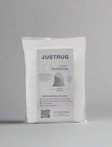 A clear package of Laundry Washing Bag, labeled with washing instructions and product details, stands upright against a gray background. Inside, a white mesh laundry bag for washable rugs is visible.