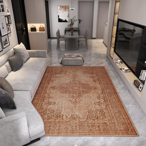 Load image 1 in gallery view. Modern living room with a gray sofa, Chateau Elegance - Washable Rug - JRN1018 (Custom Size), wall-mounted TV, dining table and four chairs, decorative wall art, neutral tones throughout, plus a pouf and vase of flowers by the dining area.
