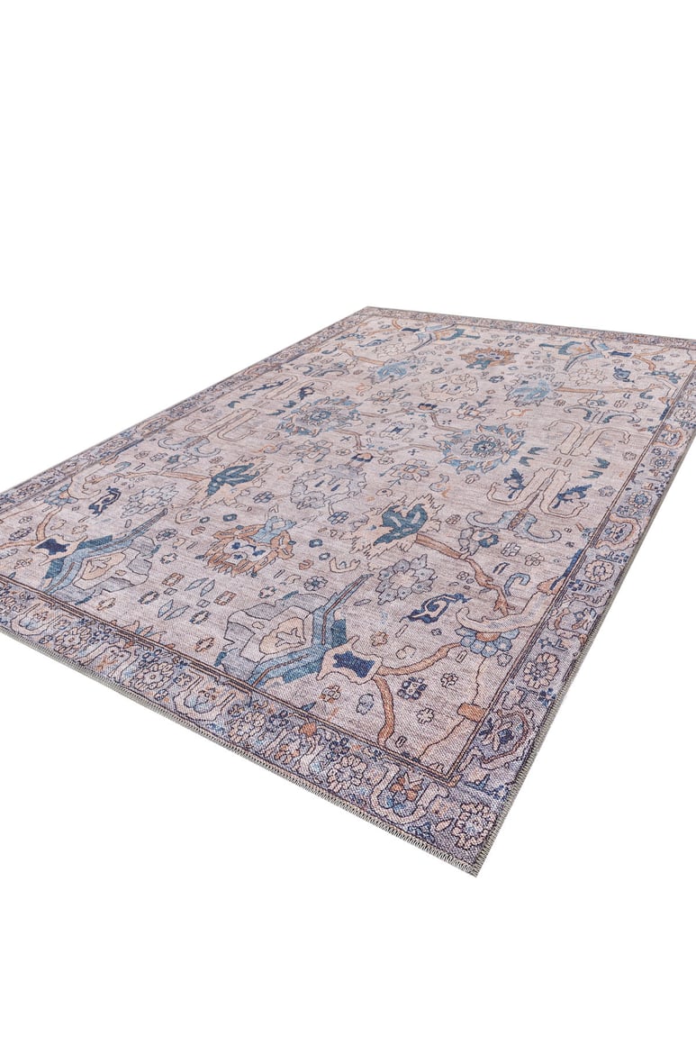 The Luminary Beige Gray Washable Rug (LCC3023) is a rectangular, flat weave rug featuring an intricate blue, beige, and gray floral and vine pattern with a decorative border in a vintage-inspired design.