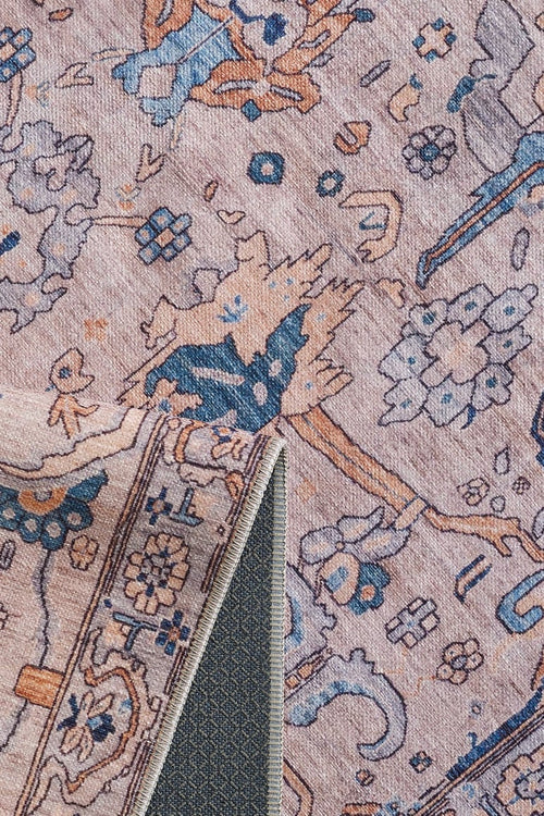 Bild 1 in Galerieansicht laden. A close-up of the Luminary Beige Gray Washable Rug - LCC3023, featuring soft pink, blue, and beige abstract floral and geometric motifs. A corner is folded to reveal the gray non-slip backing of this stylish flat weave rug.
