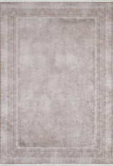 The Luxe Borderline - Washable Rug - JR1741 (Custom Size) is a rectangular, light beige rug with a subtle pattern and double border, ideal for high-traffic areas. Its minimal design pairs well with bronze and brown rugs for a cohesive look.