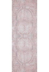 The Luxurious Design - Washable Rug - JR1924 features a faded pink and beige vintage style with intricate symmetrical patterns, decorative borders, and a distressed look—perfect for high-traffic areas.