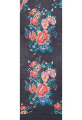 The Meadow Dream - Washable Rug - JR2001 features a dark black background with two vertical clusters of vibrant pink, red, orange, blue, and green flowers in a stylized design—ideal for high-traffic areas.
