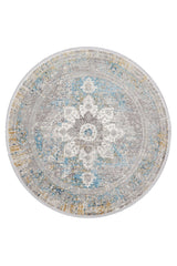 The Medallion Revamp Modernised Medallion Rug - MT002 is a round, machine-made rug with an ornate central floral medallion in blue, gray, white, and gold tones. Its distressed finish gives it a vintage, antique-inspired look.