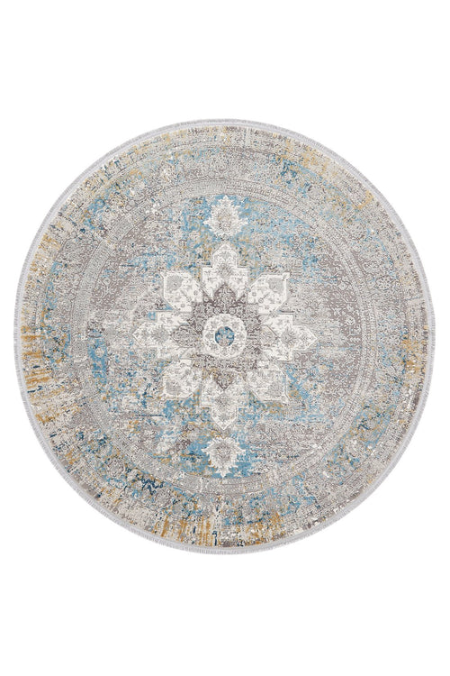 Load image 1 in gallery view. The Medallion Revamp Modernised Medallion Rug - MT002 is a round, machine-made rug with an ornate central floral medallion in blue, gray, white, and gold tones. Its distressed finish gives it a vintage, antique-inspired look.