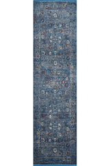 The Miniature Elegance Oushak Rug - Navy - 2084E is a rectangular machine-made area rug featuring intricate vintage-inspired blue, white, and rust patterns with floral and geometric motifs in a traditional style.