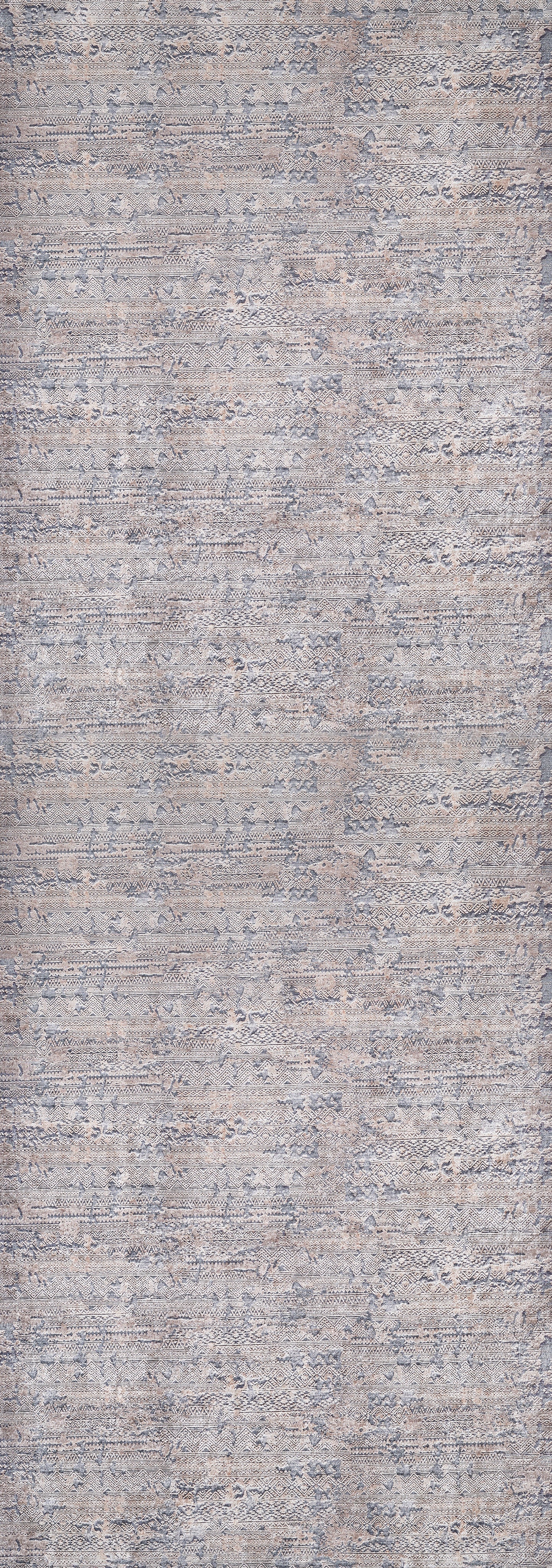 A close-up of the Modern Enigma - Machine-Washable Rug JR1883 shows textured, woven gray and light blue fabric with a subtle, irregular pattern—perfect for high-traffic areas.