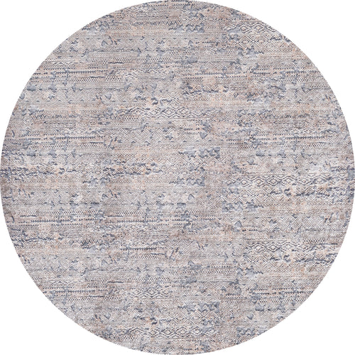 Load image 1 in gallery view. The Modern Enigma - Machine-Washable Rug JR1883 is a round, washable rug with a muted, textured pattern in beige, gray, and blue tones and subtle geometric and tribal designs—ideal for high-traffic areas.