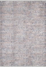 The Modern Enigma - Machine-Washable Rug JR1883 features a textured abstract pattern in grey, blue, and beige. Its subtle design, durable build, and slightly fringed edges make it ideal for high-traffic, modern neutral spaces.
