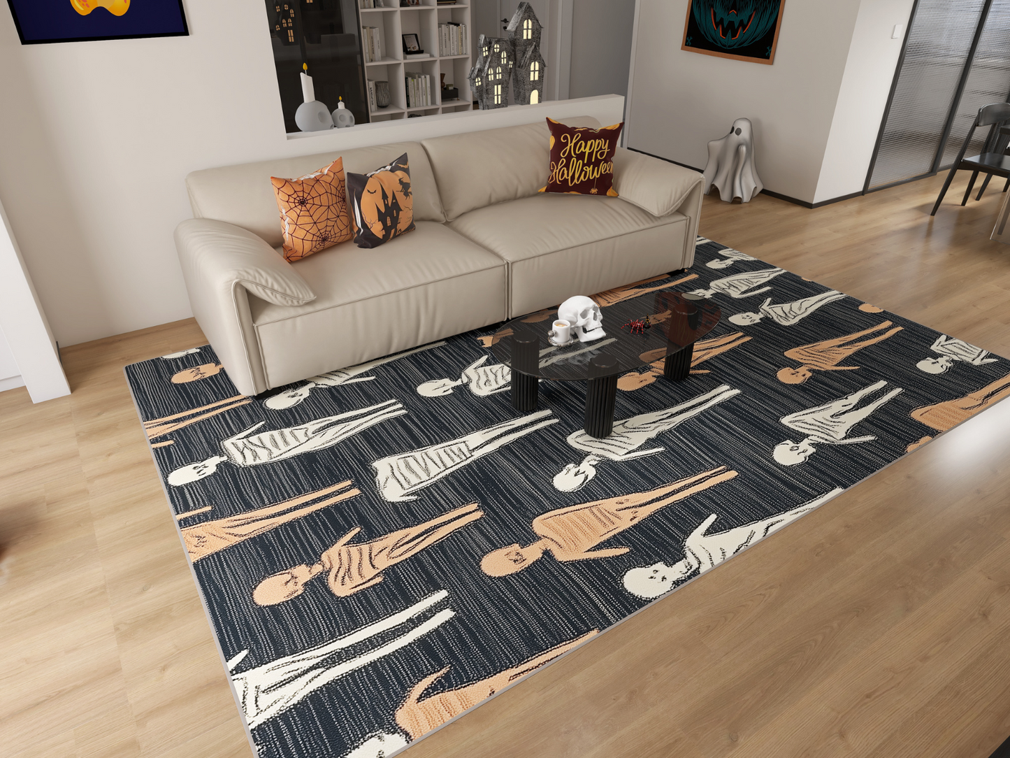 A living room decorated for Halloween features a beige sofa, themed pillows, a ghost decoration, and the Mummy March - Washable Rug - HLW004 (Custom Size) with orange and white ghosts—great for high-traffic areas. A black table holds a decorative skull.