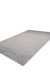 The Muted Palette Grey Ombre Rug - EW2636 is a large, rectangular, machine-made rug in gray tones featuring a subtle gradient pattern, shown here on a white background.