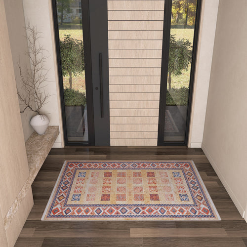 Load image 1 in gallery view. The Navajo Nights - Washable Rug - JR1758, with its colorful geometric pattern, decorates a modern entryway featuring light walls, a marble bench with a white vase and bare branches, and a large glass door—ideal for high-traffic areas.