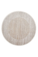 The Neutral Frame Modern Bordered Rug - EW5541 is a round, machine-made beige rug displaying a subtle gradient texture and lighter border around a darker center, shown on a white background.