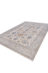 The Nexa Bordered Beige Washable Rug (LCC3009) is a rectangular flat weave rug featuring an intricate traditional pattern in blue, beige, and gray, with a decorative border and detailed geometric and floral designs.