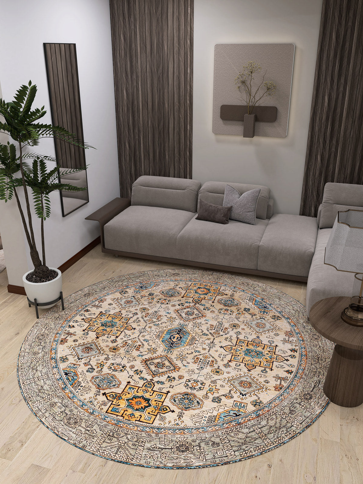 A modern living room features a light gray sectional, neutral decor, an indoor plant, and the Nexa Bordered Beige Washable Rug - LCC3009 (Custom Size) with intricate patterns on a wooden floor—ideal for high-traffic areas.