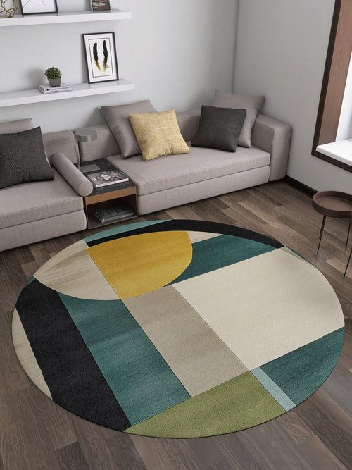 Load image 1 in gallery view. A modern living room with the Nexus Geometric Contemporary Washable Rug - MDJ006 (Custom Size) featuring an abstract design in green, yellow, black, and beige, two beige sofas with cushions, decor shelves, and a sunlit large window.