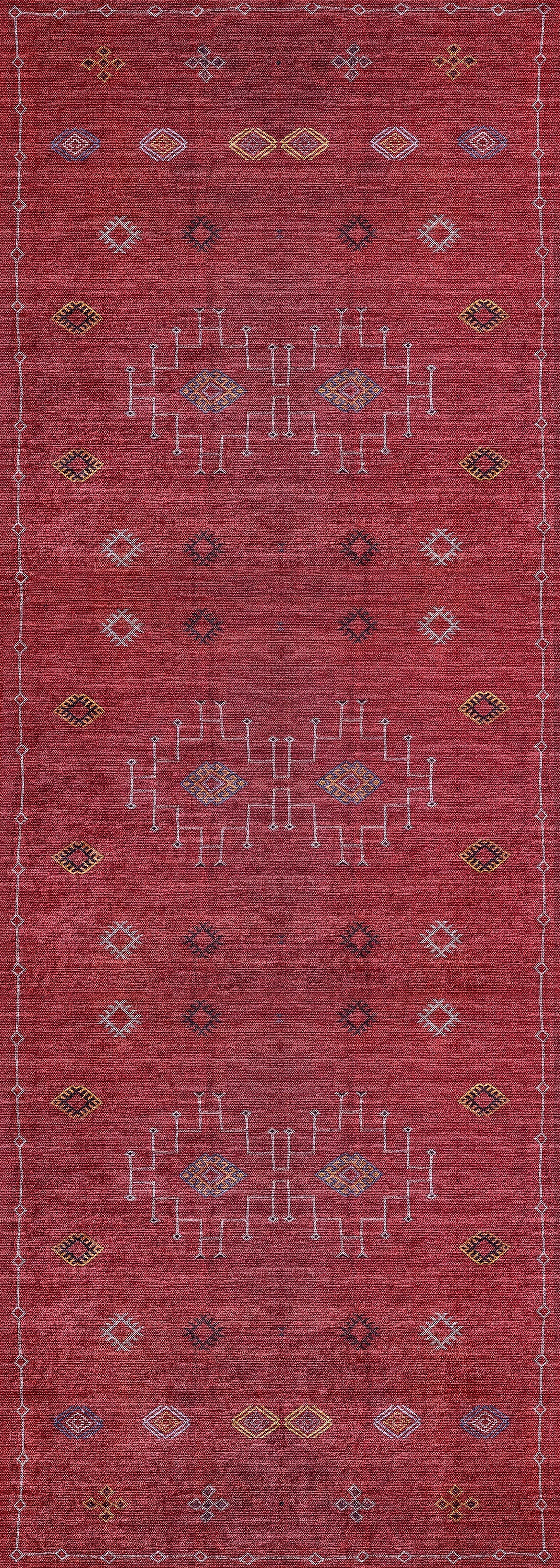 The Nomadic Journey - Washable Rug - JR5080 is a long red rug with a distressed look, featuring yellow, white, and blue geometric patterns, including white lines and diamond shapes. Durable for high-traffic areas and easy to clean.
