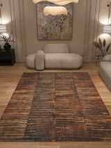 A modern living room with beige walls, abstract art, a sculptural sofa, and the Nostalgic Weft - Washable Rug - JRN33 on wood floors. Contemporary decor and soft lighting create a stylish, durable space perfect for high-traffic areas.