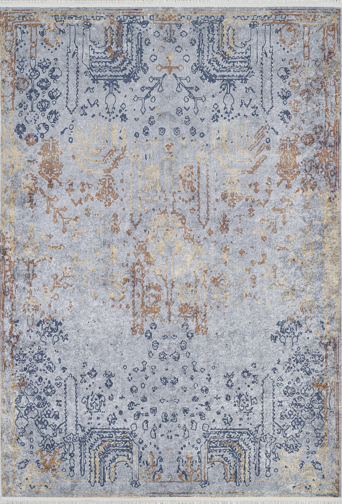 The Oriental Treasures - Machine-Washable Rug JR1613 (Custom Size) is a rectangular rug with a vintage distressed look, muted blue, gray, and gold tones, intricate faded edge patterns, and a lighter center with scattered motifs.