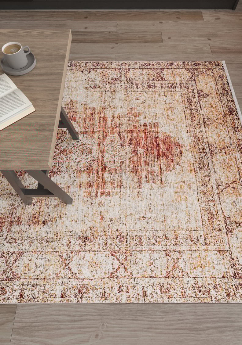 The Ornate Grace - Washable Rug - JR1009 (Outlet) US, in red, orange, and beige distressed vintage style, adds warmth and charm to any wooden floor—ideal for high-traffic spaces and relaxing with a book and coffee.