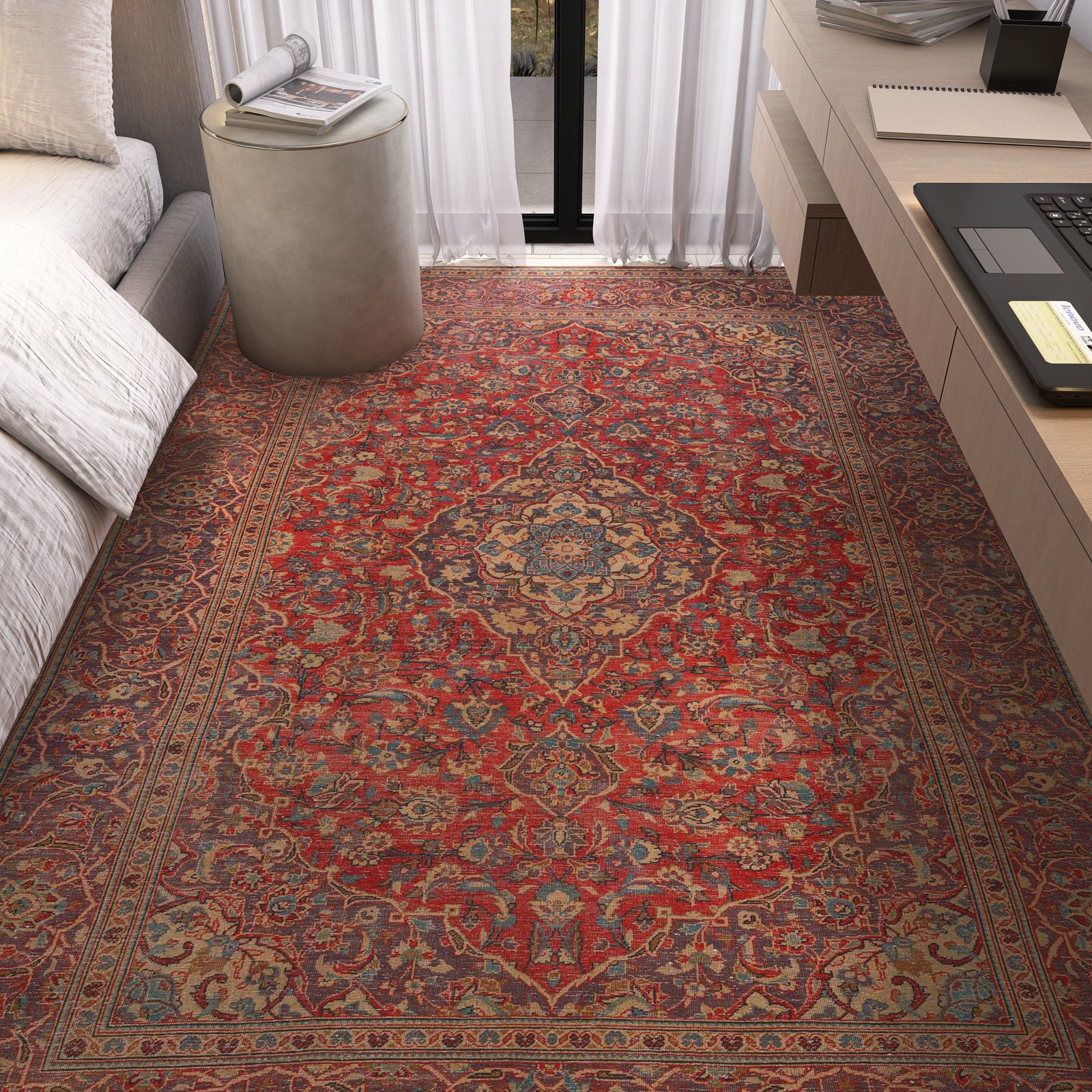 Decorative rug with intricate patterns in a living room setting.