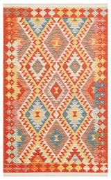 The Pastel Grid - Kilim - NMD09 is a vibrant geometric rug with a diamond pattern in red, orange, yellow, blue, and cream, enhanced by repeating triangles and zigzags.