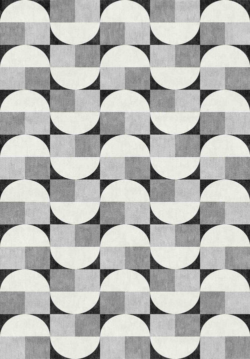Load image 1 in gallery view. The Patina Bloom - Washable Rug - JRN50 (Custom Size) features a geometric pattern of alternating semicircles and rectangles in black, white, and gray, creating a stylish optical illusion perfect for modern interiors.