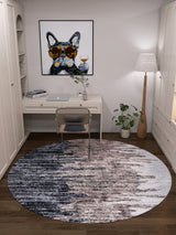 A cozy home office with a white desk and chair, a floor lamp, indoor plants, dog-in-sunglasses wall art, and the Pixelated Paradise - Machine-Washable Rug JR902—perfect for allergy-sensitive spaces. A laptop sits on the desk under built-in shelves.