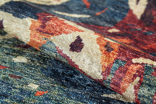 Load image 1 in gallery view. A close-up of the Psychedelic Splash - Machine-Washable Rug - JR5096 (Custom Size) reveals a textured, abstract woven pattern in blue, red, beige, and orange—washable and perfect for high-traffic areas.