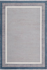 The Radiant Edges Bordered Rug - Sapphire - M542I is a rectangular acrylic-viscose rug with a light gray center, thin white and gray lines, and a wide dark blue border for a modern, clean look with classic style.