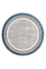 The Radiant Edges Bordered Rug - Sapphire - M542I is a machine-made round rug featuring a distressed light gray center and modern concentric rings in white, gray, and teal blue.