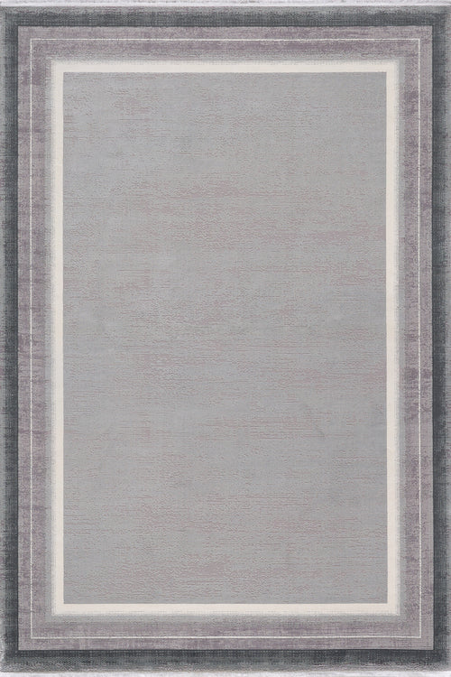 Load image 1 in gallery view. The Radiant Edges Bordered Rug - Silver - M542B features a rectangular design with a light gray center, two slim white lines, and a wide dark gray border for a modern, textured look. This rug is machine-made for durability and style.