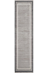 The Radiant Edges Bordered Rug - Silver (M542B) features a light gray center, slim white borders, and a dark gray edge. Its flat pile and modern rectangular design make it perfect for contemporary spaces.