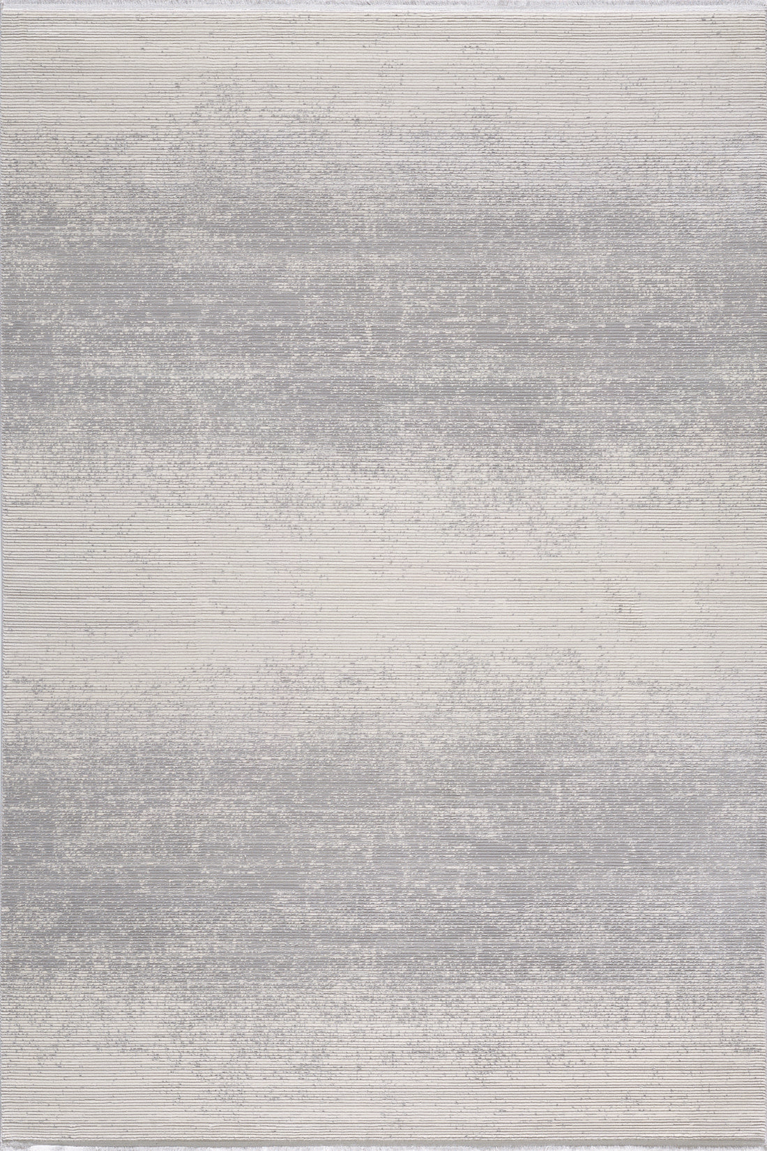 The Radient Silver Haze Ombre Rug - M497D features a flat pile with a textured surface in light gray and off-white streaks, creating an even, weathered look. Its minimalist design adds a softly faded vibe, perfect for serene spaces.