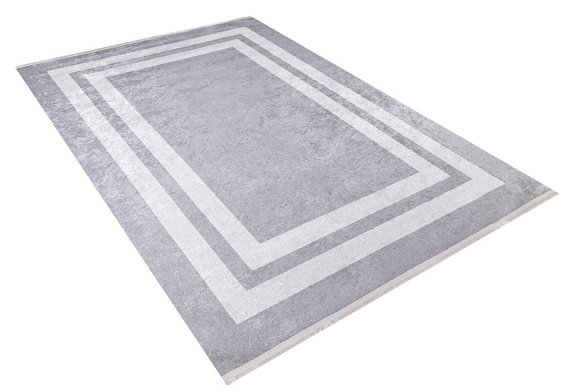 The Refined Edge - Washable Rug - JR573 (Custom Size) is a rectangular gray-anthracite rug with two nested white geometric borders, shown on a white background. Durable and washable, it's perfect for high-traffic areas.
